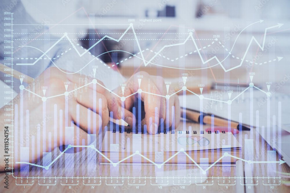 Multi exposure closeup hands with stock market forex graph.