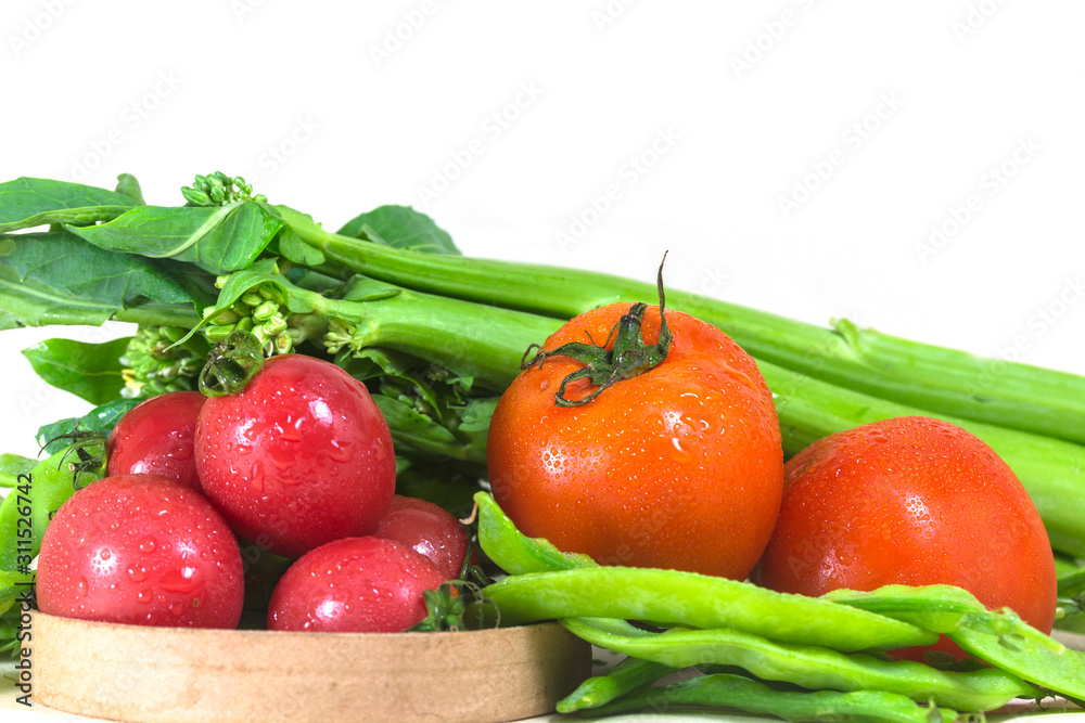 Fresh, healthy vegetables are displayed on white background. Fresh, healthy vegetables are displayed on white background.