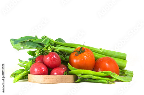 Fresh, healthy vegetables are displayed on white background.