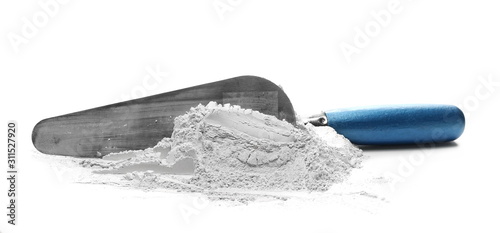 Metal trowel with cement isolated on white background