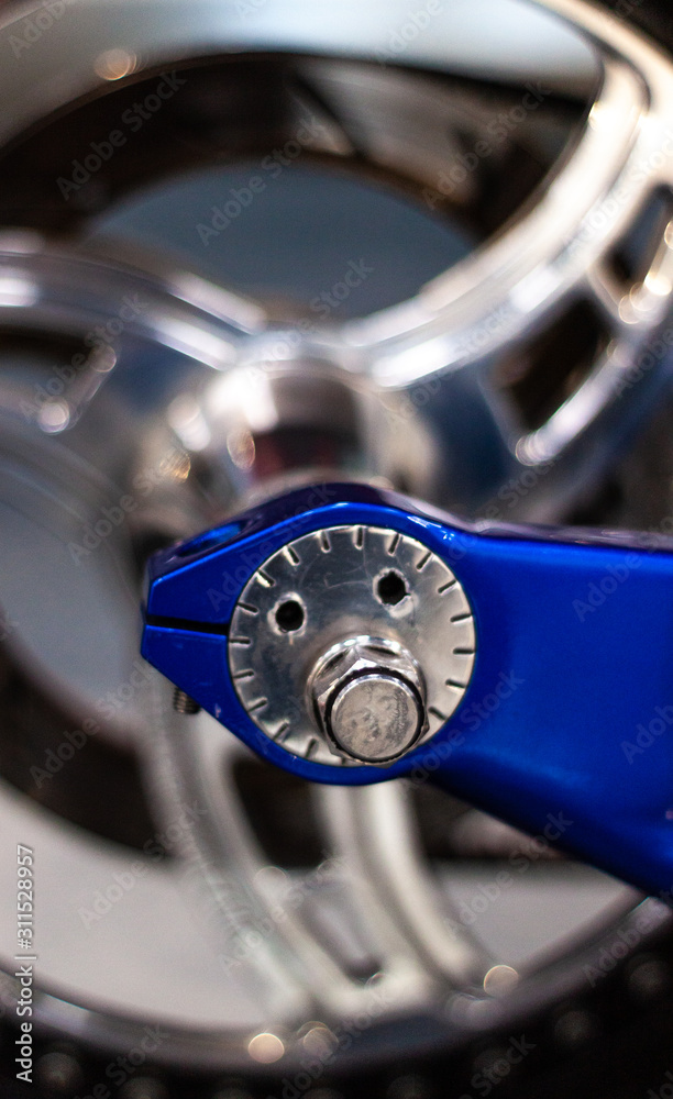 Closeup view Brake disk, wheel and tyre of a motorcycle. Chrome wheel motorbike. Closeup view Brake disk, wheel and tyre of a motorcycle. Chrome wheel motorbike.