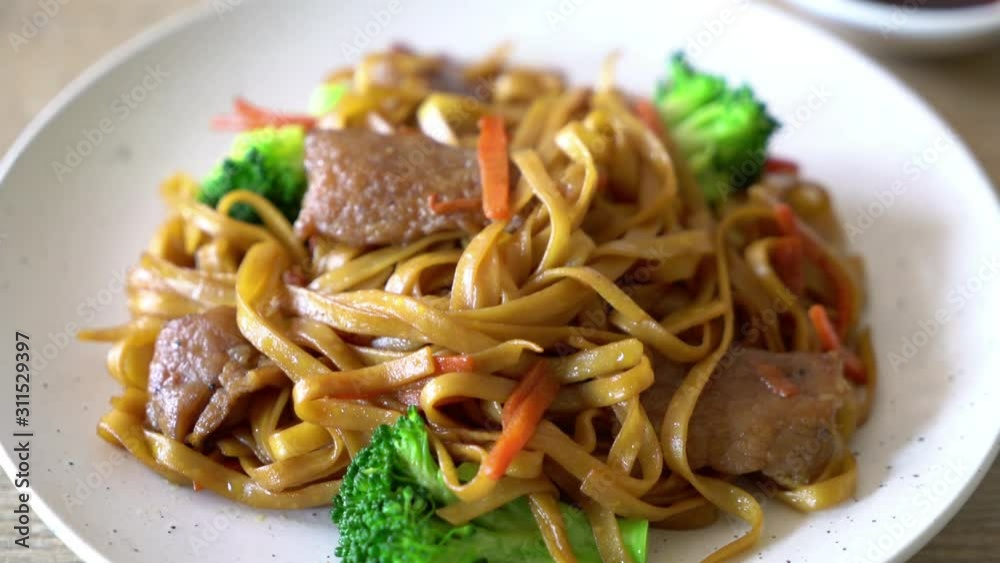 stir-fried noodle with pork - Asian style stir-fried noodle with pork - Asian style