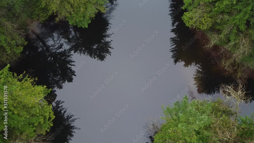 Flying down above lake