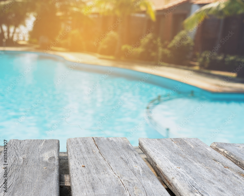 Obraz premium table on the backgroundof the pool