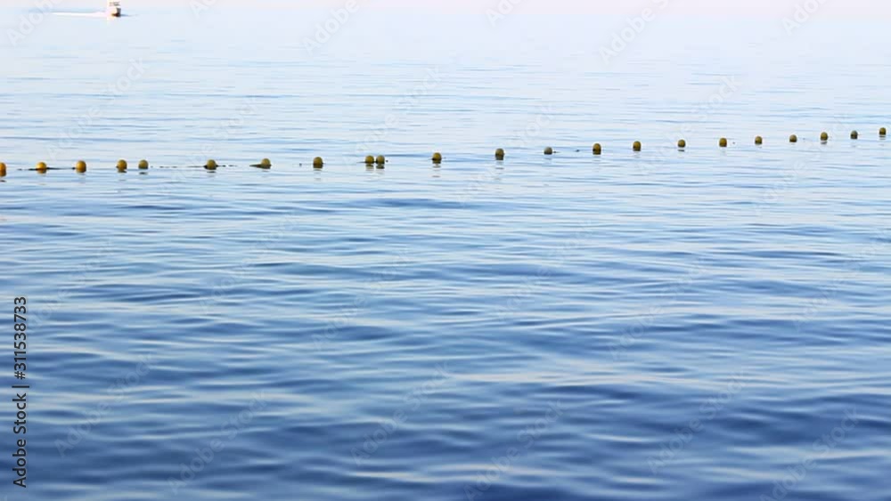 Small boat approaches to the shore. Small boat approaches to the shore.