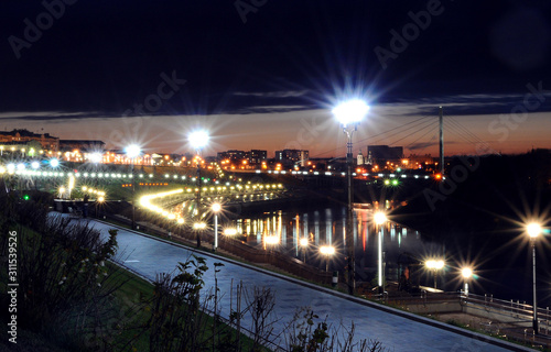 travel photography, cityscape, sunset city lights, harbor and bridge over the river at night