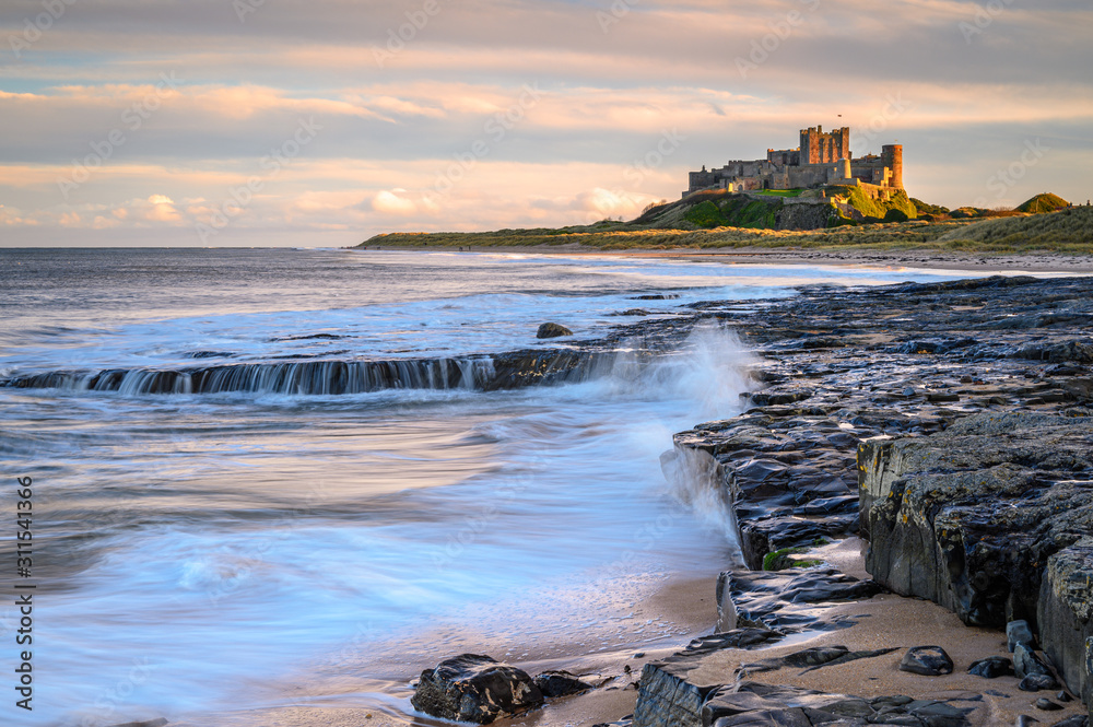 Bamburgh Beach below the Castle, and dunes which are dominated by the imposing medieval castle and located within Northumberland Coast Area of Outstanding Natural Beauty