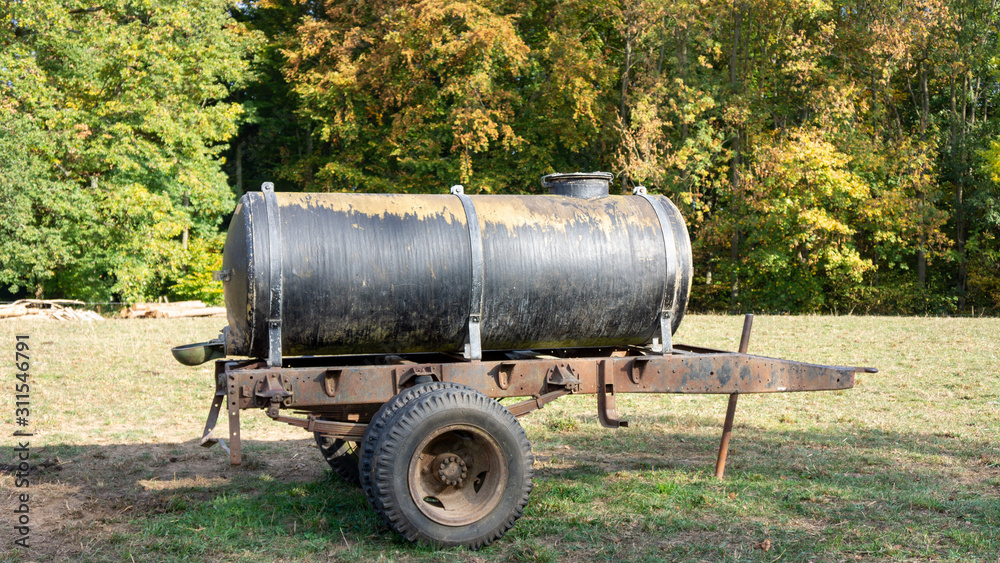 water tank on the cow pasture