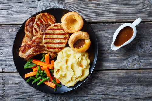 Sunday roast with grilled pork chops, flatlay