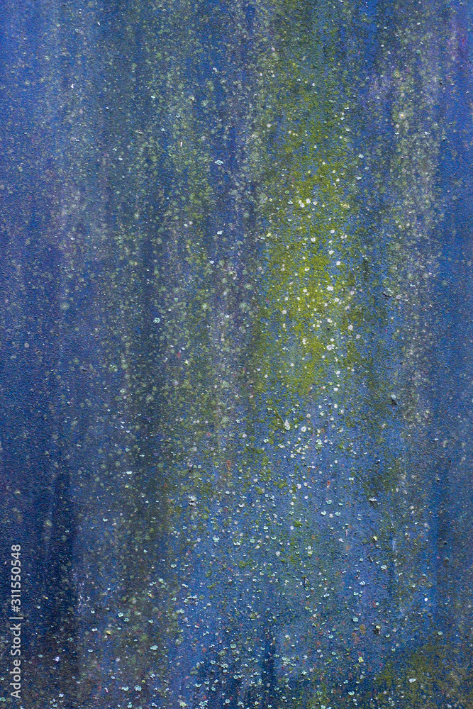 Rusty metal painted texture background. Blue, yellow.