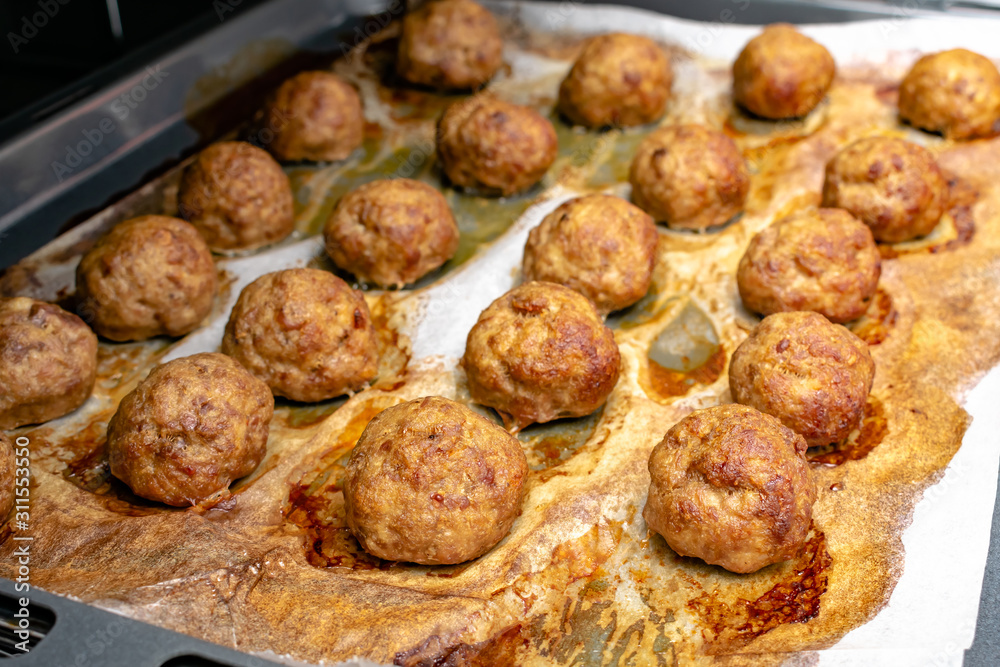 Delicious rustic roasted meatballs with carrot and onion