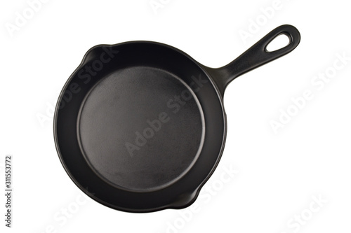 Cast iron pan over white background with clipping path, top view of empty cast iron skillet