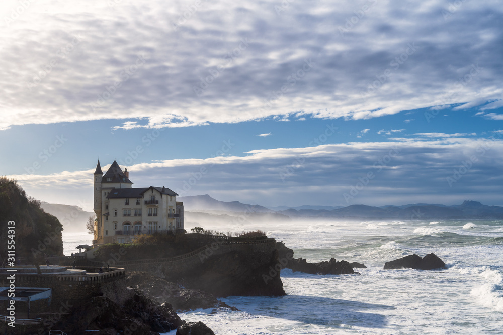 Biarritz during the winter time with white ocean and beautiful clouds. Basque Country of France. Biarritz during the winter time with white ocean and beautiful clouds. Basque Country of France.