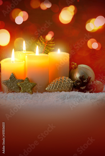 Four yellow burning advent candles. Christmas card.