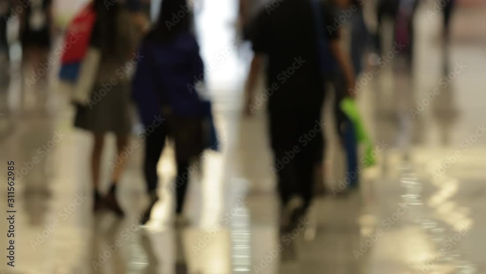 People walking inside building with blurry image, time lapse People walking inside building with blurry image, time lapse