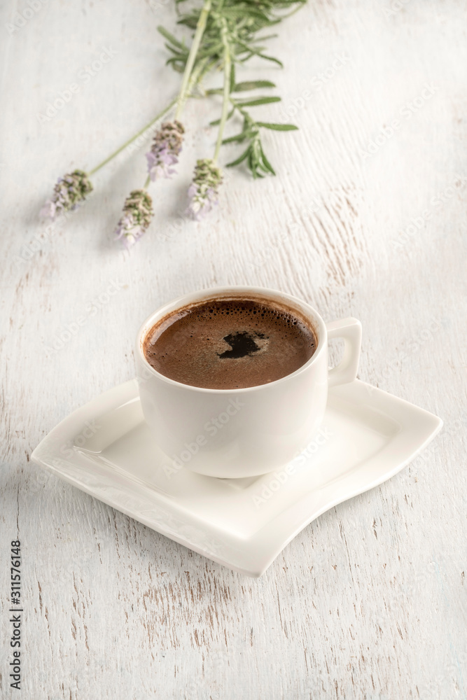 Turkish coffee on a table decorated with lavender flowers Turkish coffee on a table decorated with lavender flowers