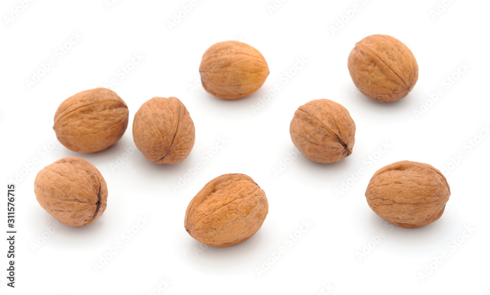 Eight walnuts isolated on a white. Eight walnuts isolated on a white.