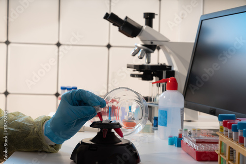 Young woman in food quality control lab