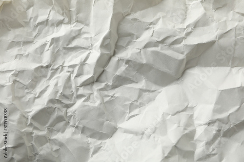 Crumpled paper texture background, close up backdrop