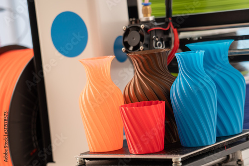 3D Printer Plastic filament for 3D printer and printed products in the interior of the design office