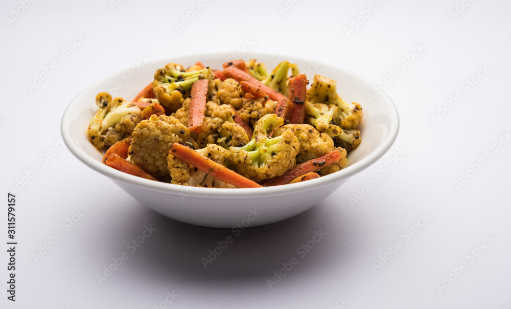 Carrots, cauliflowers achar made using PhoolGobi and Gajar. It's a sweet and sore seasonal pickle from India Carrots, cauliflowers achar made using PhoolGobi and Gajar. It's a sweet and sore seasonal pickle from India