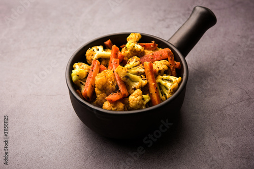 Carrots, cauliflowers achar made using PhoolGobi and Gajar. It's a sweet and sore seasonal pickle from India photo