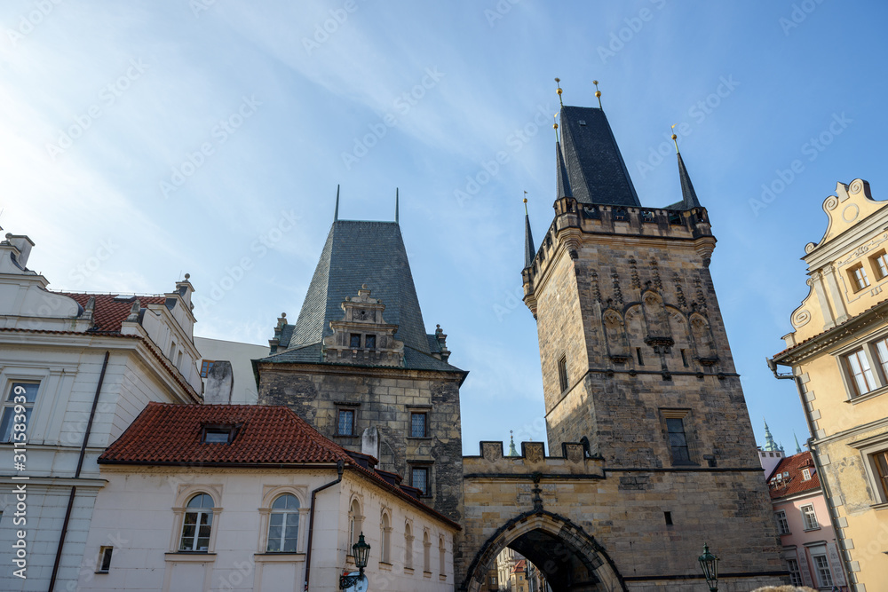 Close-up western towers of Charles Bridge in Prague, Czech Republic.