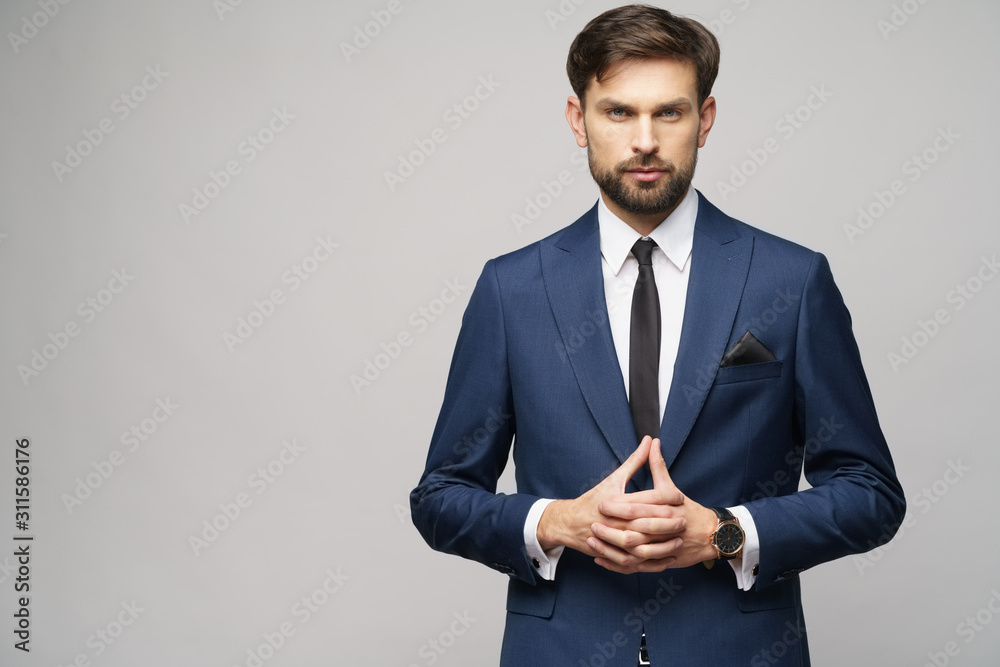studio photo of young handsome businessman wearing suit studio photo of young handsome businessman wearing suit