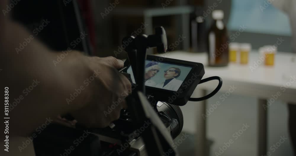 Film camera on set in studio while filming a commercial Film camera on set in studio while filming a commercial