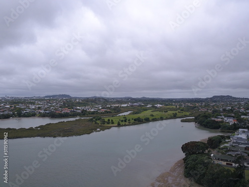 Waiheke Island, Auckland / New Zealand - December 24, 2019: The paradise island Waiheke with its stunning beaches, coastlines, hill terrains and vineyards photo