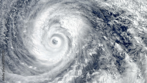 Eye of the Hurricane. Hurricane on Earth. Typhoon over planet Earth.. Category 5 super typhoon approaching the coast. View from outer space. (Elements of this image furnished by NASA) photo