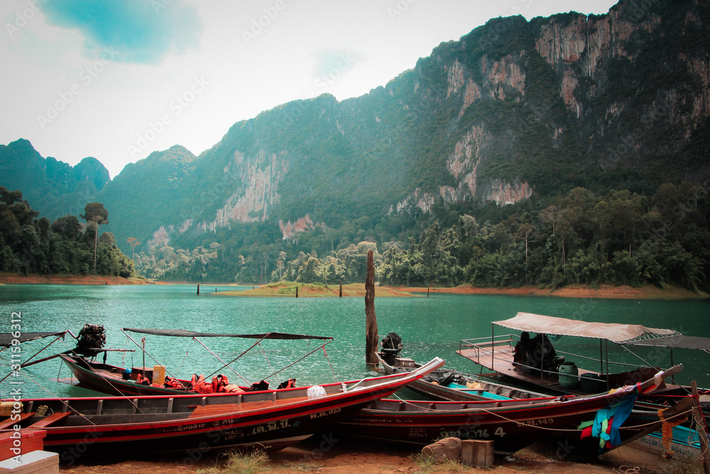 Beautiful mountain with long tail boat at Khao Sok National Park, Suratthani , Thailand.