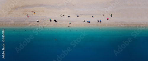 Aerial drone ultra wide photo of secluded turquoise exotic paradise bay with sandy beach © aerial-drone