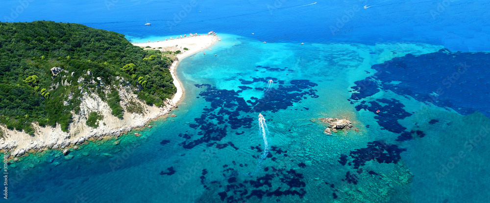 Aerial drone ultra wide photo of iconic small island of Marathonisi with turquoise sea, Zakynthos island, Ionian, Greece