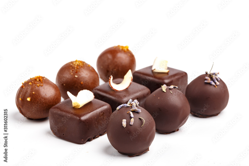 Fine handmade chocolates. Isolated on white background Fine handmade chocolates. Isolated on white background