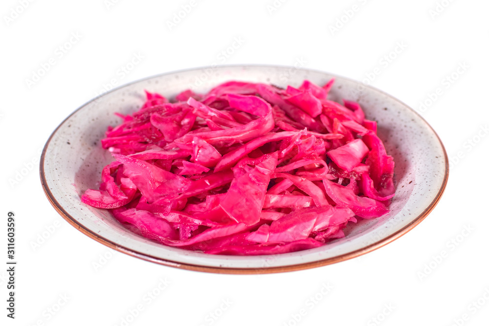 Tasty red sauerkraut or fermented cabbage in marinade on a plate isolated on white. Tasty red sauerkraut or fermented cabbage in marinade on a plate isolated on white.
