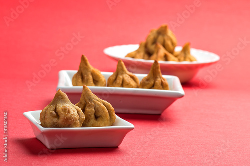 Indian Food: Modak, Maharashtra Sweet Dish, favourite sweet of lord ganesha, greeting card design. Copy-space. photo