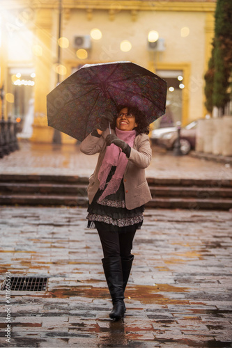 pretty brunette woman in a rainy day