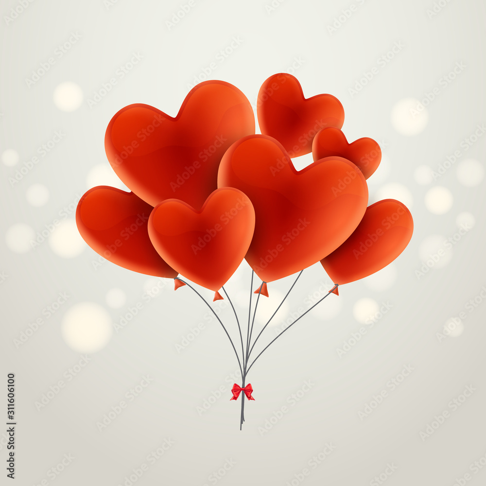 Red balloon in heart form. Celebration decoration for happy holiday. Red balloons heart in air
