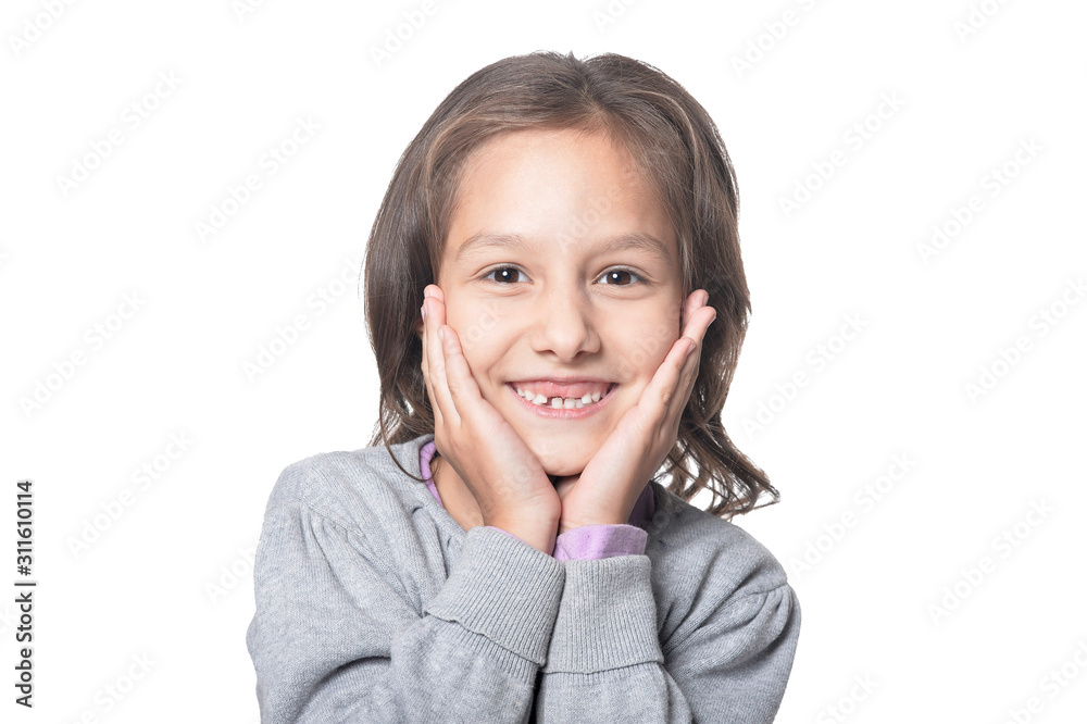 Close up portrait of cute little girl posing isolated on white background Close up portrait of cute little girl posing isolated on white background