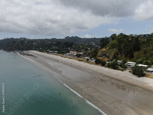 Waiheke Island, Auckland / New Zealand - December 24, 2019: The paradise island Waiheke with its stunning beaches, coastlines, hill terrains and vineyards photo