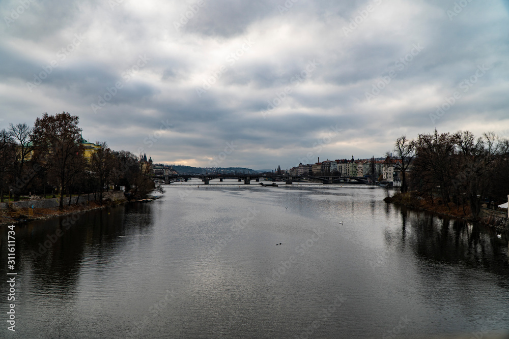 View of Prague from the bridge, Prague bridges on moldava with traffic