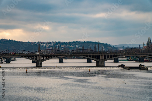 View of Prague from the bridge, Prague bridges on moldava with traffic © daniele