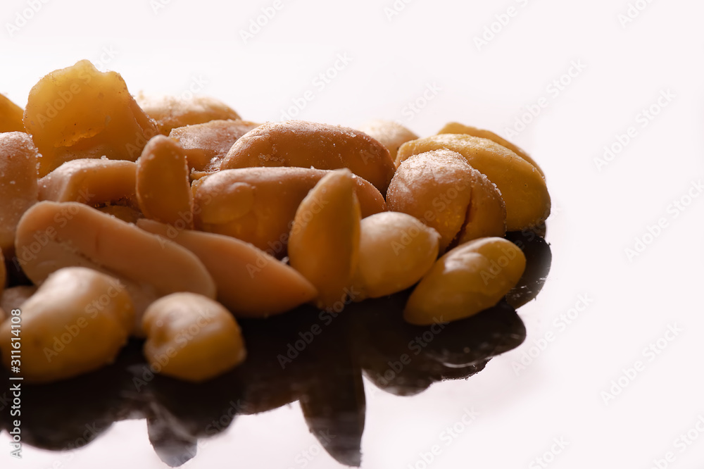 Fototapeta premium Roasted peanuts, sprinkled with salt