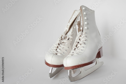 White figure skates close up boots and blades for skating