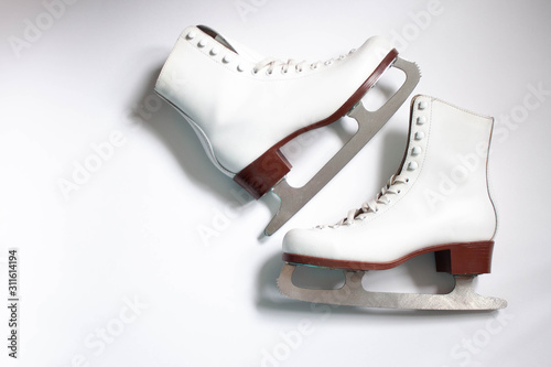 White figure skates close up boots and blades for skating