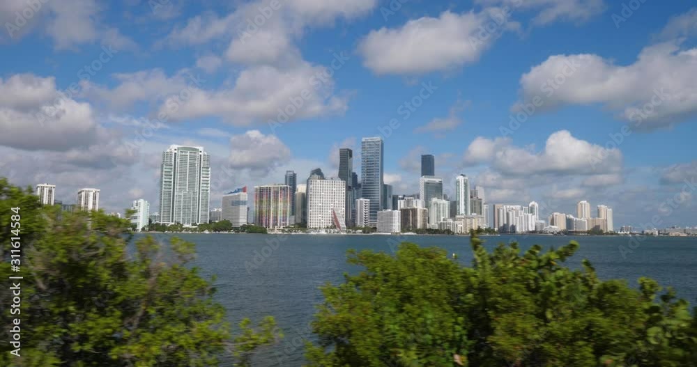 A slow motion tracking shot of the iconic Miami skyline on a sunny summer day. A slow motion tracking shot of the iconic Miami skyline on a sunny summer day.