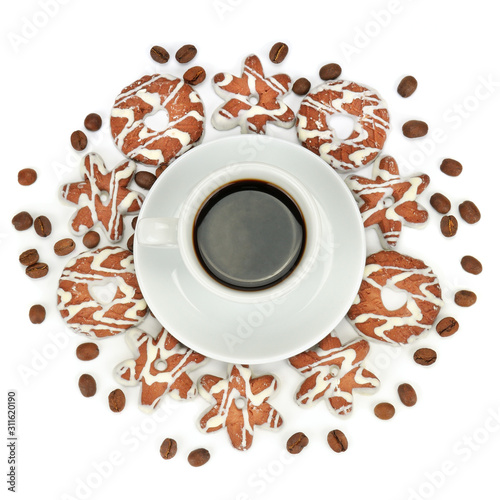 Cup with coffee and gingerbread cookies isolated on white background. Flat lay, top view.