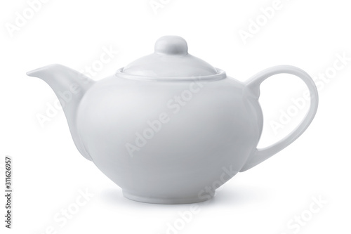 Side view of white ceramic teapot photo