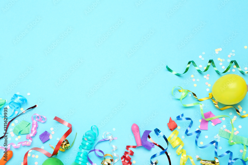 Colorful ribbons with yellow balloon and confetti on blue background - obrazy, fototapety, plakaty 